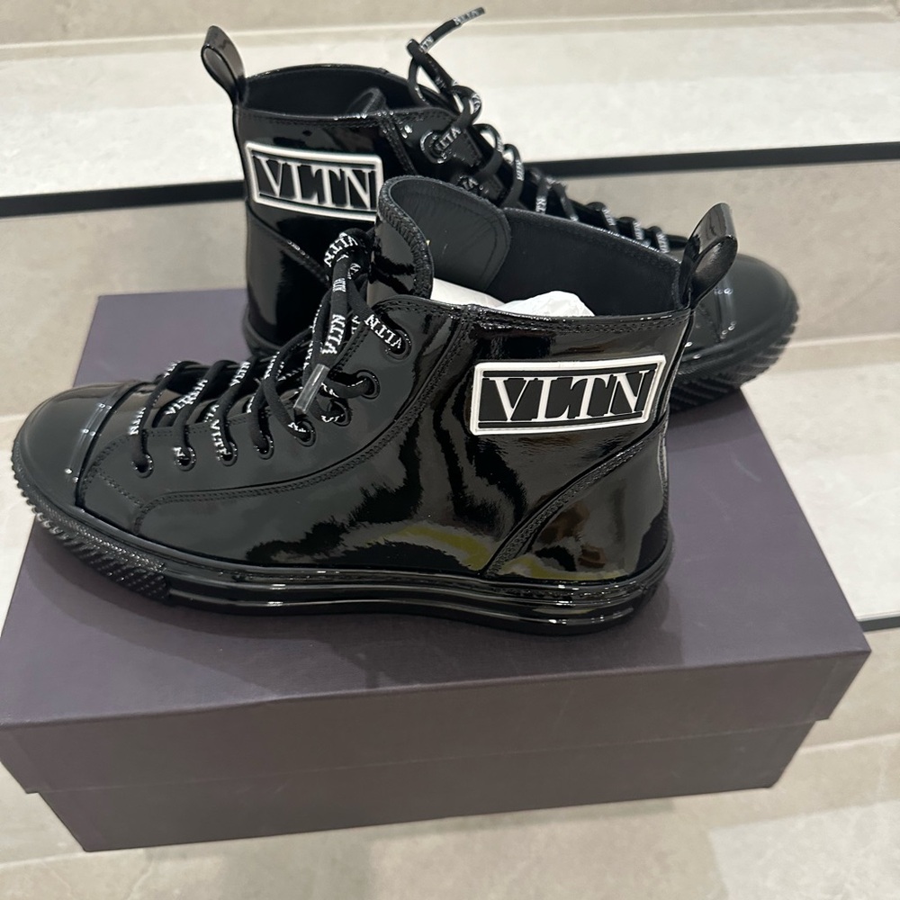 Brand new Valentino hightop sneakers.